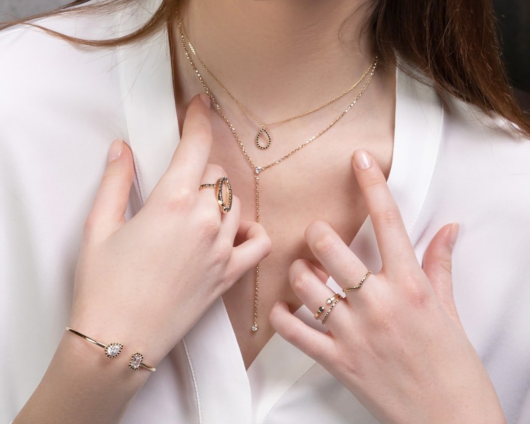 Gold jewelry layering guide: necklaces, rings, and bracelets done right